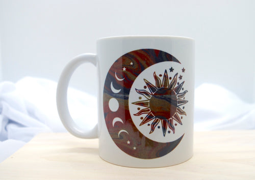 Between the Moon and the Sun Coffee Mug